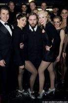 Aoife Mulholland (Roxie Hart), Justin Lee Collins (Amos Hart), Tiffany Graves (Velma Kelly) and the cast backstage after the curtain call for 11th anniversary gala performance of Chicago at the Cambridge Theatre, London, England on 4th December 2008. (Credit should read: Dan Wooller/wooller.com). Paid use only. No Syndication